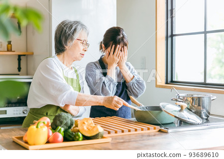An elderly woman who complains about the food and a young woman who cries 93689610