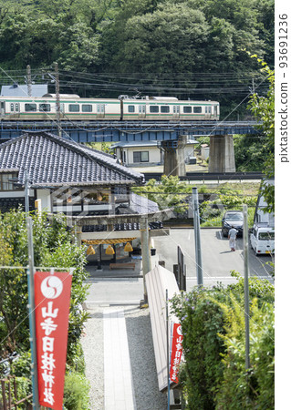 Scenery of a mountain temple in summer Torii of Hie Shrine and a train on the Senzan Line Yamagata City, Yamagata Prefecture Scenery of a mountain temple in summer Torii of Hie Shrine and a train on the Senzan Line Yamagata City, Yamagata Prefecture 93691236