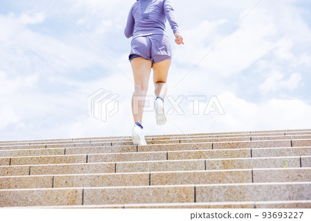 A woman aiming for weight loss on a staircase diet 93693227