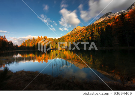 Lej Nair in engadine valley in an autumn landscape 93694469