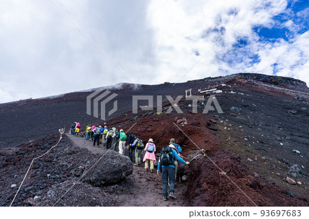 Climb Mt. Fuji, the highest mountain in Japan, from the Yoshida Trail Climb Mt. Fuji, the highest mountain in Japan, from the Yoshida Trail 93697683
