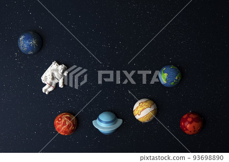 Spaceman and planets on space background 93698890