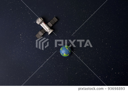 satellite and earth on space background satellite and earth on space background 93698893