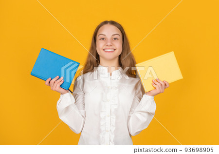 kid hold notebook. student in high school. teen girl do homework with copybook. kid hold notebook. student in high school. teen girl do homework with copybook. 93698905