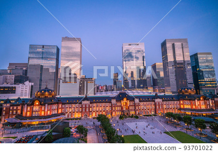 Tokyo cityscape in Japan New view of Tokyo station. A row of skyscrapers (sunset reflected in the window glass), night view Tokyo cityscape in Japan New view of Tokyo station. A row of skyscrapers (sunset reflected in the window glass), night view 93701022