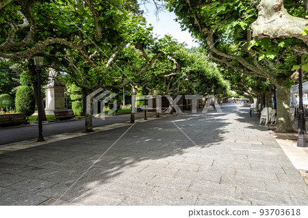 Street called Paseo del Espolon on the river bank in the city of Burgos, Spain 93703618