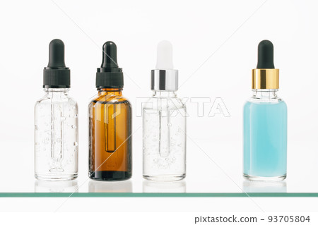 Several glass bottles cosmetics. serum aroma oil for beauty on white background 93705804