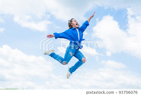 Add some action to your life. happy kid on sky background. cheerful retro girl. child having fun. happy childhood. enjoy good weather forecast. girl wearing casual style clothes. spring fashion wear Add some action to your life. happy kid on sky background. cheerful retro girl. child having fun. happy childhood. enjoy good weather forecast. girl wearing casual style clothes. spring fashion wear 93706076