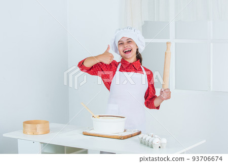 excited kid show thumb up in kitchen, success excited kid show thumb up in kitchen, success 93706674