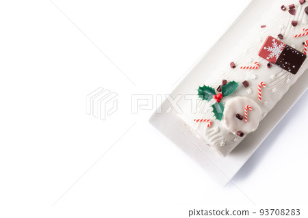White chocolate yule log cake 93708283