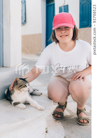 Tourist in Pyrgos, Tinos island, Cyclades, Greece Tourist in Pyrgos, Tinos island, Cyclades, Greece 93708523