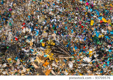 Ecological catastrophe caused by piles of plastic rubbish and waste. Garbage dump in rural area on sunny day. Environmental pollution aerial view Ecological catastrophe caused by piles of plastic rubbish and waste. Garbage dump in rural area on sunny day. Environmental pollution aerial view 93709576