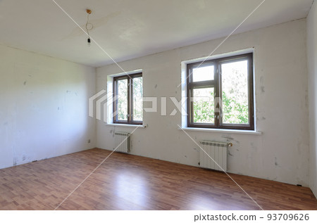 A fragment of a room with a fine finish, a view of two windows 93709626