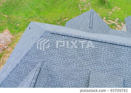 Roofing construction house rooftops covered with asphalt shingles 93709781