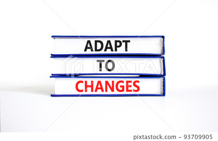 Adapt to changes and support symbol. Concept words Adapt to changes on books. Beautiful white table white background. Business and support Adapt to changes quote concept. Copy space. Adapt to changes and support symbol. Concept words Adapt to changes on books. Beautiful white table white background. Business and support Adapt to changes quote concept. Copy space. 93709905