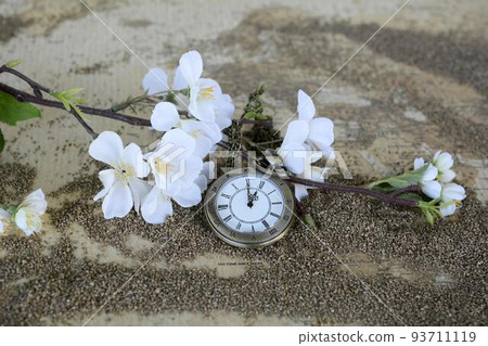 Vintage pocket watch and hour glass or sand timer, symbols of time with copy space 93711119