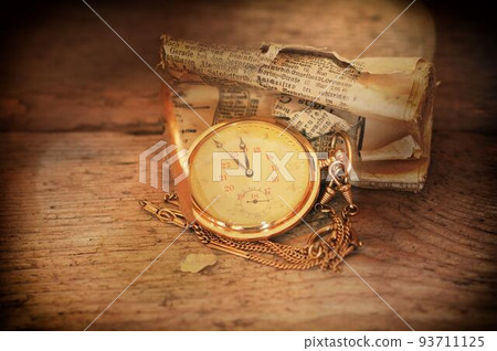 Vintage pocket watch and hour glass or sand timer, symbols of time with copy space 93711125