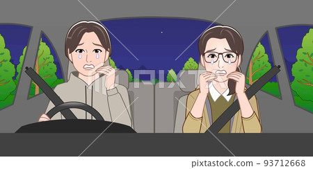 A man and a woman are riding in a car at night 93712668
