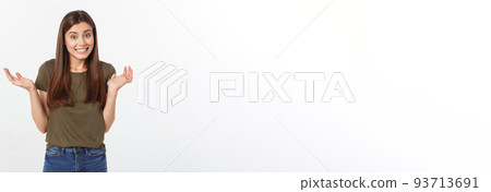 Girl with a suspicious look and hand on her side on a white isolated background. 93713691
