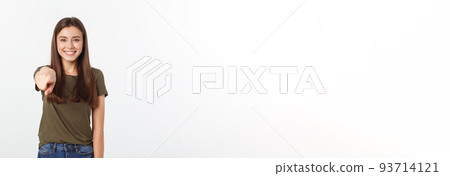 portrait of attractive smile laugh teenage girl, pointing her finger, wear green shirt, white teeth, brown long hair, isolated over white background. 93714121