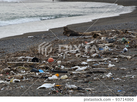 A lot of drifting garbage washed up on the beach beach A lot of drifting garbage washed up on the beach beach 93714860
