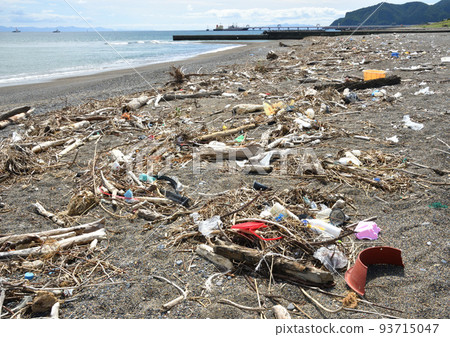 A lot of drifting garbage washed up on the beach beach A lot of drifting garbage washed up on the beach beach 93715047