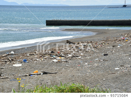 A lot of drifting garbage washed up on the beach beach A lot of drifting garbage washed up on the beach beach 93715084