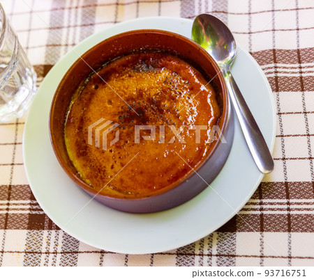 Just prepared burnt cream served in bowl 93716751