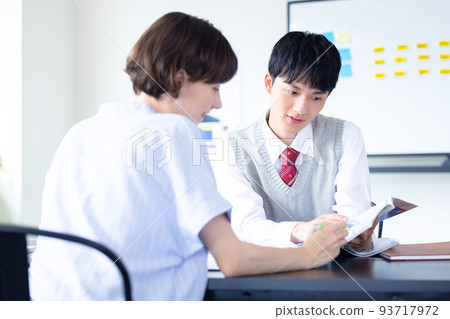High school student High school student studying with a foreign teacher High school student High school student studying with a foreign teacher 93717972