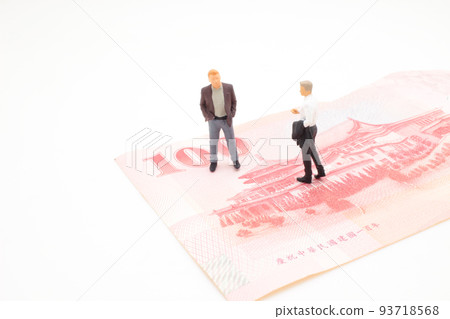 the figure business man tanding on bank note 93718568