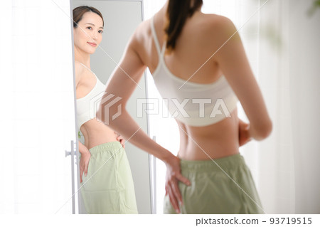 A woman who cares about her waist on a diet A woman who cares about her waist on a diet 93719515