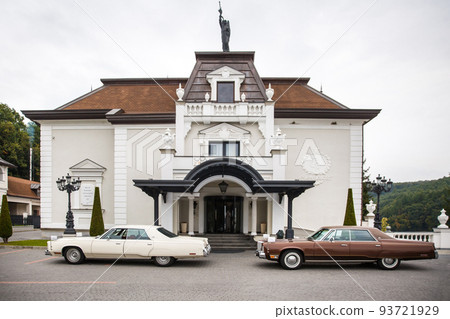 Two wedding cars near the bride's house Two wedding cars near the bride's house 93721929