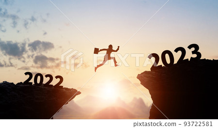 Man jumping to 2023 New Year's card for business 2023 New Year's card 93722581