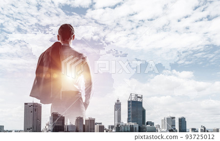 Concept of business success and control with confident boss against cityscape background 93725012
