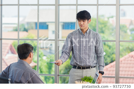 businessman anti bribery and corruption he rejecting money in white envelope offered by partner 93727730