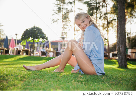 Nice woman wearing a shirt and swimsuit Nice woman wearing a shirt and swimsuit 93728795