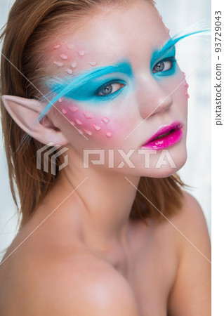 Charming girl in the image of an elf 93729043