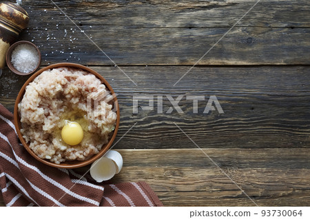 Cooking chicken minced meat with spices and egg 93730064