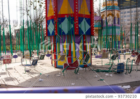 Carousel for children during war in Ukraine shot by Russian soldiers Carousel for children during war in Ukraine shot by Russian soldiers 93730210