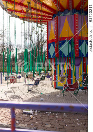 Carousel for children during war in Ukraine shot by Russian soldiers 93730211