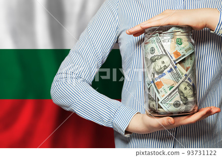 Bulgarian finanse, banking and saving money. US dollars cash on flag of Bulgaria background Bulgarian finanse, banking and saving money. US dollars cash on flag of Bulgaria background 93731122