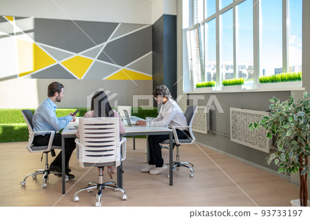 Group of professionals working in the office Group of professionals working in the office 93733197