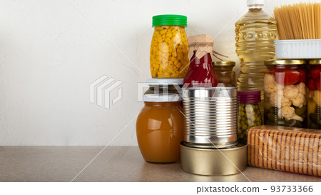 Emergency survival food set on white kitchen table 93733366