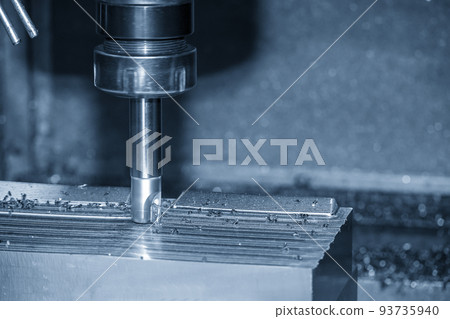 Close up scene the CNC milling machine rough cutting the injection mold parts by indexable tools. 93735940