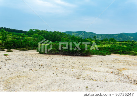 landscape of Kunashir island, tephra beach of a hot lake at the bottom of Golovnin volcano caldera landscape of Kunashir island, tephra beach of a hot lake at the bottom of Golovnin volcano caldera 93736247