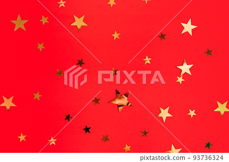 Golden stars glittering confetti on red background. Trendy festive holiday backdrop. Many star-shaped particles for a postcard, invintation or web banner. 2023 merry xmas backplate Golden stars glittering confetti on red background. Trendy festive holiday backdrop. Many star-shaped particles for a postcard, invintation or web banner. 2023 merry xmas backplate 93736324