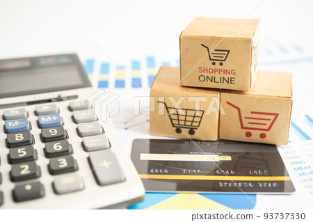 Shopping online box with credit card and calculator on graph. Finance commerce import export business concept. 93737330
