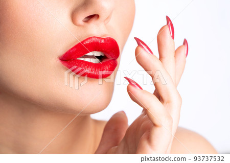 Close-up Beautiful lips. Sexy plump lips which red lipstick. 93737532