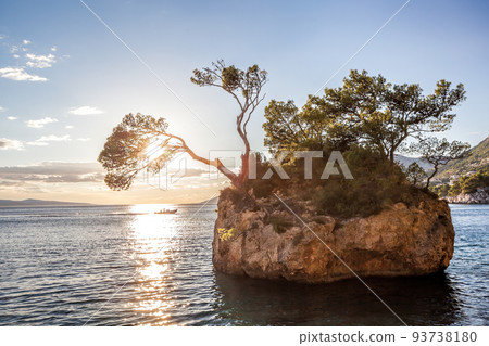 Punta Rata beach with stone island in Brela,Makarska, Dalmatia, Croatia Punta Rata beach with stone island in Brela,Makarska, Dalmatia, Croatia 93738180