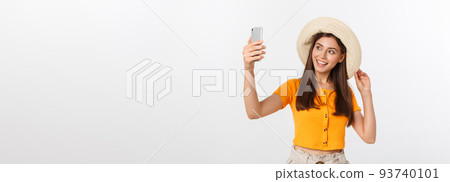 Young Caucasian woman enjoying the selfie with herself isolated on white background summer travel concept. 93740101